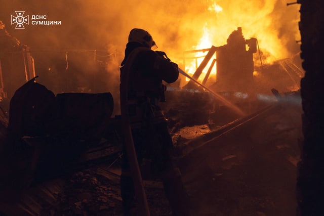 A firefighter works at a site of a Russian drone strike, amid Russia's attack on Ukraine, in Sumy region, Ukraine in this handout picture released May 29, 2025.  Press service of the State Emergency Service of Ukraine in Sumy region/Handout via REUTERS