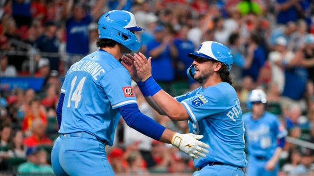 Kansas City Royals first baseman Vinnie Pasquantino (9) is congratulated by designated hitter Jac Caglianone (14) after he scored against the St. Louis Cardinals during the fifth inning at Busch Stadium on June 3, 2025.