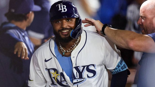 Rays third baseman Junior Caminero celebrates after hitting a solo home run during a 5-1 victory over the Rangers on Tuesday.