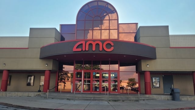 AMC, America's largest cinema chain, is finally saying yes to ads before films play in theatres.
