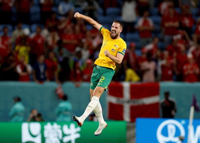 Soccer Football - FIFA World Cup Qatar 2022 - Group D - Australia v Denmark - Al Janoub Stadium, Al Wakrah, Qatar - November 30, 2022 Australia's Milos Degenek celebrates after qualifying for the knockout stages REUTERS/John Sibley/File Photo