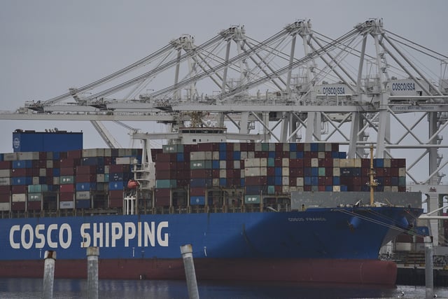 FILE -The "Cosco Shipping France" container ship is moored at the Long Beach Container Terminal, LBCT, at Middle Harbor in the Port of Long Beach, Calif., , April 15, 2025. (AP Photo/Damian Dovarganes, File)