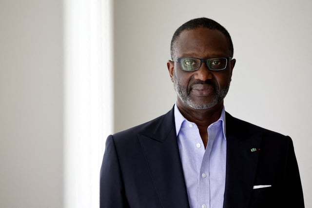 Tidjane Thiam, president of the PDCI (Democratic Party of Cote d'Ivoire), Ivory Coast's main opposition leader and former Credit Suisse Chief Executive, poses after an interview with Reuters in Paris, France, April 23, 2025. REUTERS/Stephanie Lecocq/File Photo