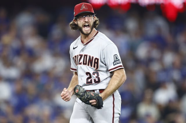 LOS ANGELES, CALIFORNIA - OCTOBER 09: Zac Gallen #23 of the Arizona Diamondbacks reacts after striking out Freddie Freeman #5 of the Los Angeles Dodgers to end the fifth inning in Game Two of the Division Series at Dodger Stadium on October 09, 2023 in Los Angeles, California.