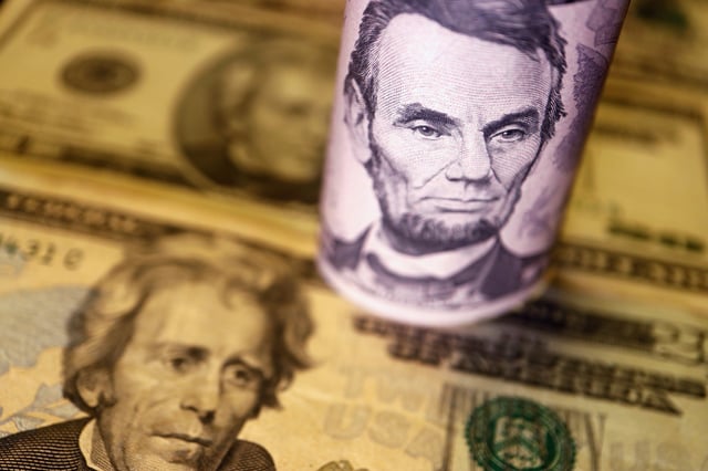 U.S. Dollar banknotes are seen in this illustration picture taken June 14, 2022. REUTERS/Florence Lo/Illustration/File Photo