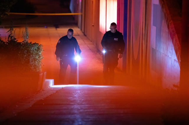 Police officers work the scene of a shooting in the North York area of Toronto on Wednesday, June 4, 2025.