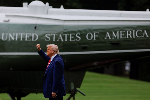 U.S. President Donald Trump gestures next to Marine One, as he departs for Pennsylvania, on the South Lawn of the White House in Washington, D.C., U.S., May 30, 2025. REUTERS/Kent Nishimura/File Photo