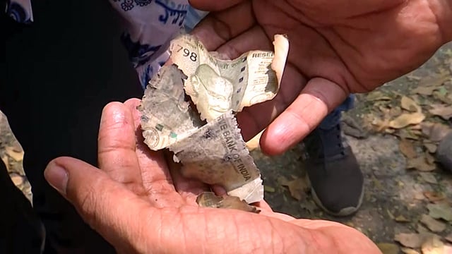 Burnt currency notes seen near the residence of Delhi High Court judge Justice Yashwant Varma, in New Delhi.