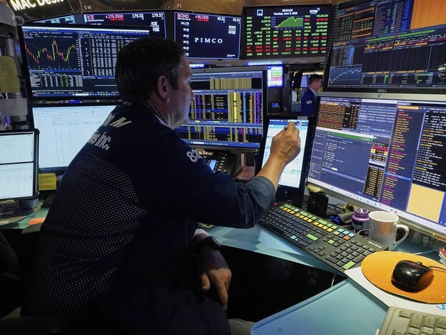 Trader Leon Montana works on the floor of the New York Stock Exchange, Tuesday, June 3, 2025. (AP Photo/Richard Drew)
