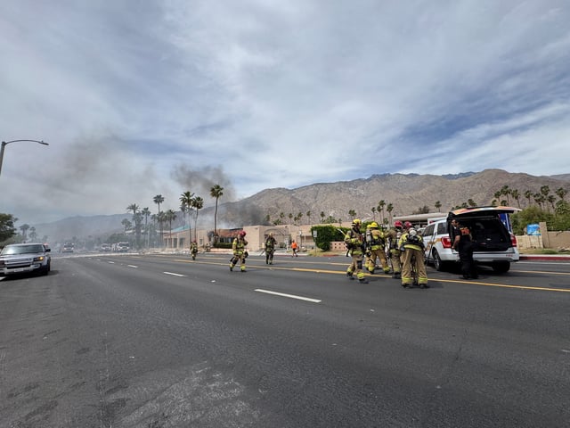 Firefighters work after a bomb exploded near a reproductive health clinic in Palm Springs, California, U.S., May 17, 2025, in this picture obtained from social media. Luis Roman/@luisromanvlog via REUTERS/File Photo