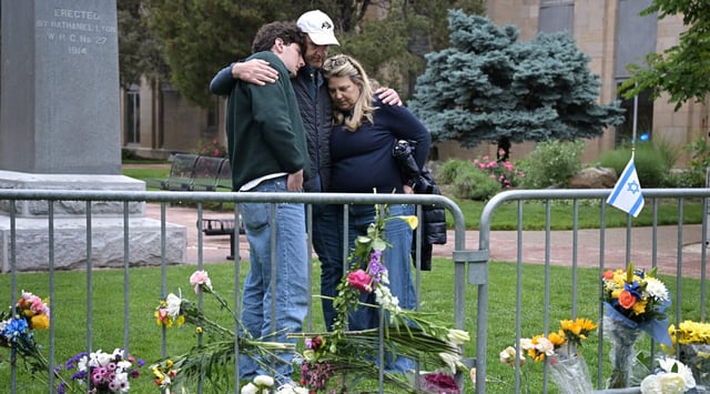Isaac Dechtman of Denver and his parents Evan and Jennifer comfort each other at the Boulder County Courthouse on Pearl Street in Boulder, Colorado, on June 3, 2025, two days after 12 people marching to raise awareness for Israeli hostages in Gaza were injured in a "targeted act of violence" by a man wielding incendiary devices. (Hyoung Chang/The Denver Post)