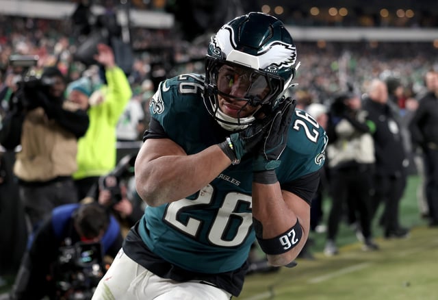Saquon Barkley #26 of the Philadelphia Eagles reacts to his touchdown against the Washington Commanders during the fourth quarter in the NFC Championship Game at Lincoln Financial Field on January 26, 2025 in Philadelphia, Pennsylvania. The victory celebrations were marred by chaos, including a stabbing and a car hitting a crowd of pedestrians.