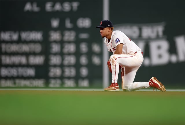 Kristian Campbell #28 of the Boston Red Sox reacts after missing a hit by Nolan Schanuel #18 of the Los Angeles Angels in the fifth innign at Fenway Park on June 03, 2025 in Boston, Massachusetts.