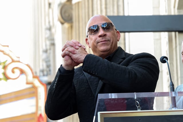 Vin Diesel speaks at Gal Gadot's Hollywood Walk of Fame Star Ceremony in front of El Capitan in Los Angeles on March 18, 2025.