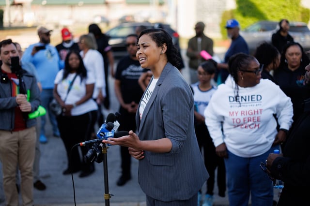 Harvey 2nd Ward Ald. Colby Chapman speaks with attendees during a news conference before a City Council meeting May 12, 2025, in Harvey. Earlier in the month Chapman was charged with misdemeanor offenses after being forcibly removed by police during a City Council meeting. (Armando L. Sanchez/Chicago Tribune)