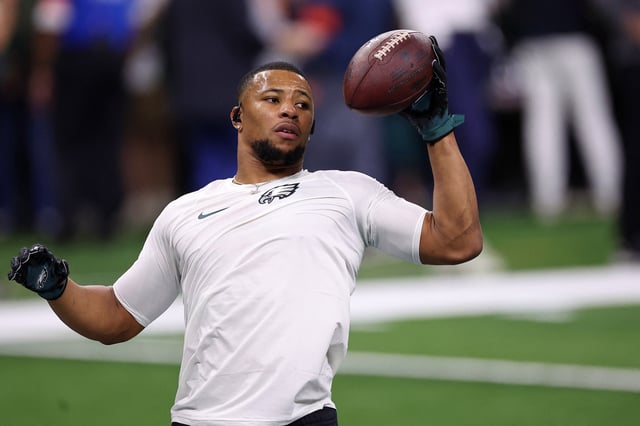 Feb 9, 2025; New Orleans, LA, USA; Philadelphia Eagles running back Saquon Barkley (26) warms up before Super Bowl LIX between the Philadelphia Eagles and the Kansas City Chiefs at Caesars Superdome. Mandatory Credit: Bill Streicher-Imagn Images
