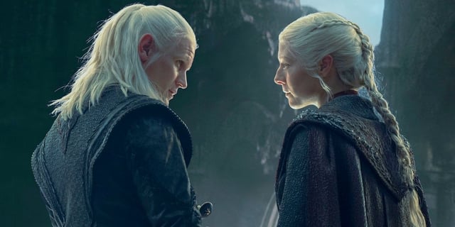 Daemon Targaryen (Matt Smith) in half-profile standing close to and staring at Rhaenyra Targaryen (Emma D'Arcy) in the House of the Dragon Season 2 finale