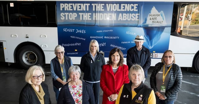 Lyn Nicholson, Prue McCausland, Pamela Armstrong, Karen Hadley, Sallyann Geale, Carol Fuller, Denis Garland and Nina Cox at the launch of White Ribbon's Metro bus message. Picture by Phillip Biggs