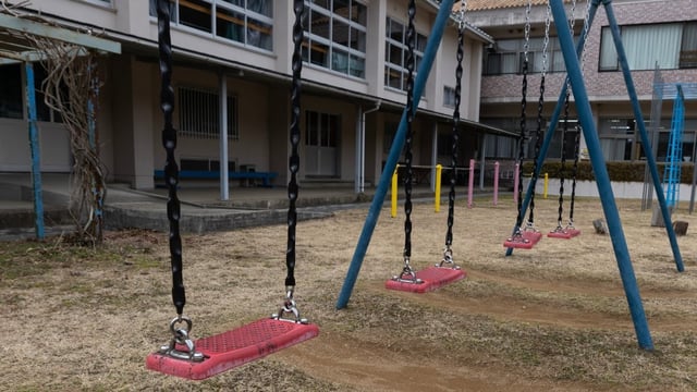 The abandoned Okumo Elementary School is shown after it was closed in 2016 due to a declining birth rate, in Tamba-Sasayama, Japan. The country's falling birth rate is deeply impacting rural areas and small towns, leading to serious economic and social challenges.