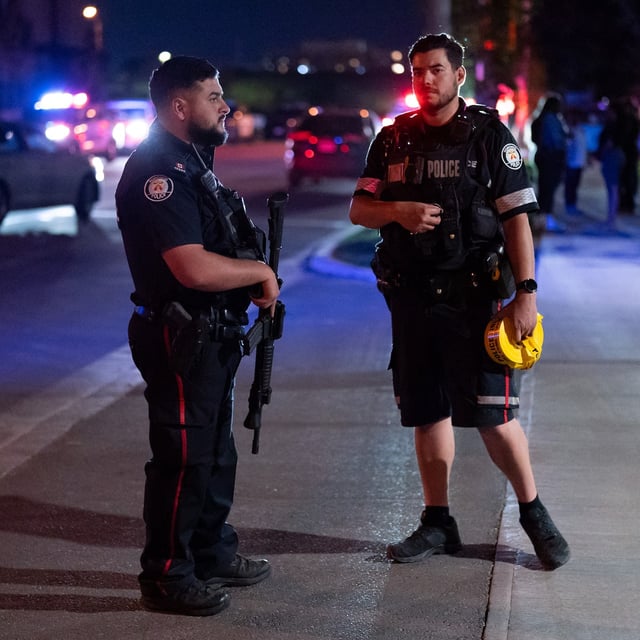 Police officers work the scene of a shooting in the North York area of Toronto on Tuesday, June 3, 2025. THE CANADIAN PRESS/Arlyn McAdorey