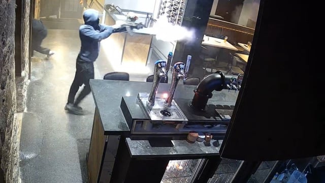 Toronto police released security camera footage Wednesday showing a snippet of the shooting at the Piper Arms Pub in Scarborough earlier this year. Investigators announced arrests and charges linked to the shooting as part of a larger investigation in the region.