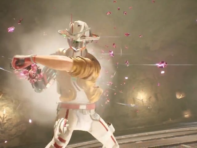 A man with a robotic head swings a sword toward the screen