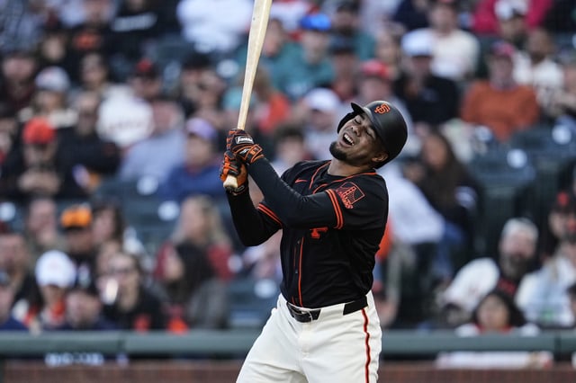 San Francisco Giants' LaMonte Wade Jr. reacts after striking out during the third inning of a baseball game against the Seattle Mariners, Saturday, April 5, 2025, in San Francisco. (AP Photo/Godofredo A. Vásquez)