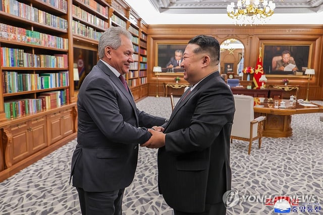 This photo, carried by North Korea's official Korean Central News Agency on June 5, 2025, shows the North's leader Kim Jong-un (R) meeting with Russia's Security Council Secretary Sergei Shoigu in Pyongyang the previous day. (For Use Only in the Republic of Korea. No Redistribution) (Yonhap)