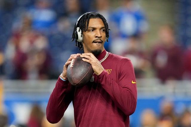 DETROIT, MICHIGAN - JANUARY 18: Jayden Daniels #5 of the Washington Commanders warms up prior to playing the Detroit Lions in the NFC Divisional Playoff at Ford Field on January 18, 2025 in Detroit, Michigan. (Photo by Nic Antaya/Getty Images)