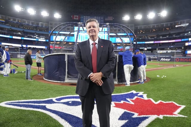Rogers Communications Inc. executive chair Edward Rogers stands on the field during batting practice ahead of a Toronto Blue Jays home opener against the Seattle Mariners in American League MLB baseball action in Toronto on April 8, 2024. THE CANADIAN PRESS/Chris Young
