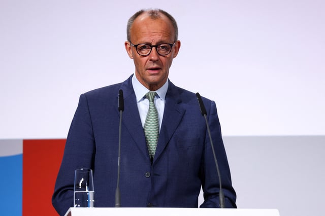 German Chancellor Friedrich Merz delivers a speech at the German Association of Towns and Municipalities event in Berlin, Germany, June 3, 2025. REUTERS/Christian Mang/File Photo