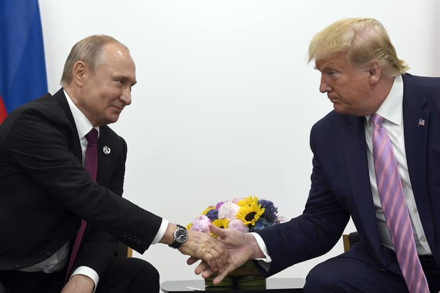 President Donald Trump, right, shakes hands with Russian President Vladimir Putin, left, during a bilateral meeting on the sidelines of the G-20 summit in Osaka, Japan, June 28, 2019.