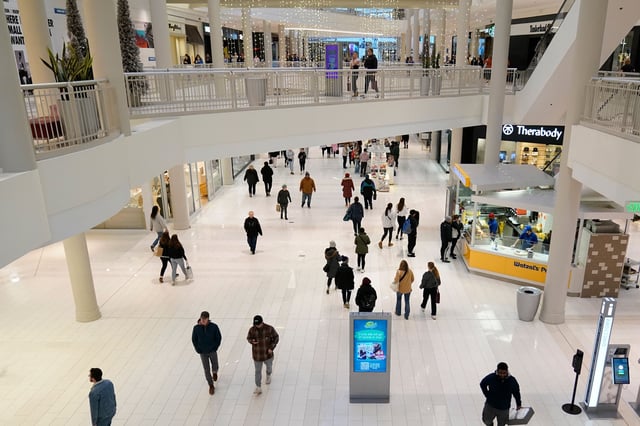 People shop at the Mall of America in Bloomington, Minnesota on November 24, 2023.