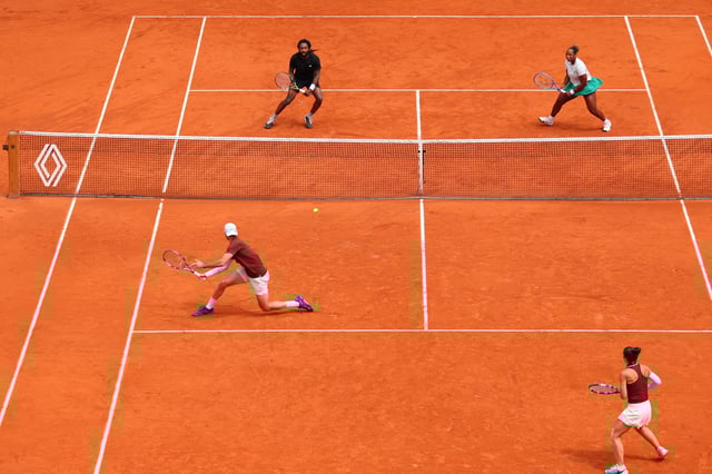 Tennis - French Open - Roland Garros, Paris, France - June 5, 2025 Italy's Andrea Vavassori and Sara Errani in action during their mixed doubles final match against Taylor Townsend and Evan King of the U.S. REUTERS/Denis Balibouse