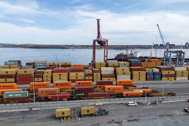 A drone view shows cranes, shipping containers and transport trucks at the Port of Montreal in Montreal, Quebec, Canada April 14, 2025. REUTERS/Carlos Osorio/File Photo