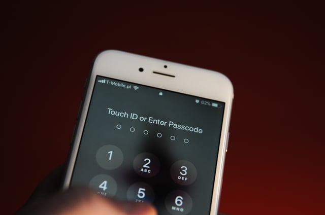 An iPhone prompting to enter the passcode is seen on October 25, 2017. (Photo by Jaap Arriens/NurPhoto via Getty Images)