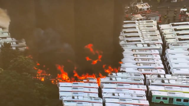  Thick black smoke billows as 20 SEPTA buses engulfed in flames at a Philadelphia bus depot