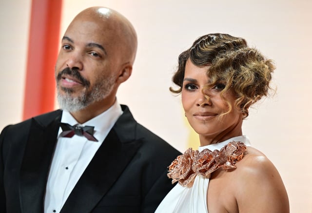 US actress Halle Berry and singer Van Hunt attend the 95th Annual Academy Awards at the Dolby Theatre in Hollywood, California on March 12, 2023.