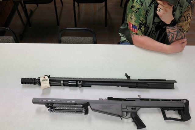 An employee shows a .50 Caliber Barrett M107A1 semi-automatic rifle to Reuters at a gun store in Racine, Wisconsin, U.S., June 26, 2023.    REUTERS/Brian Snyder/File Photo
