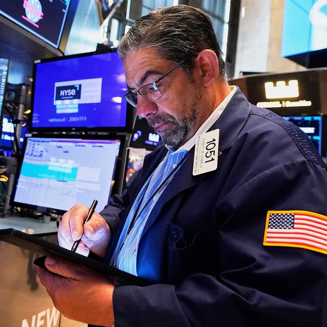 Specialist Genaro Saporito, left, and trader Robert Oswald work on the floor of the New York Stock Exchange, Tuesday, June 3, 2025.