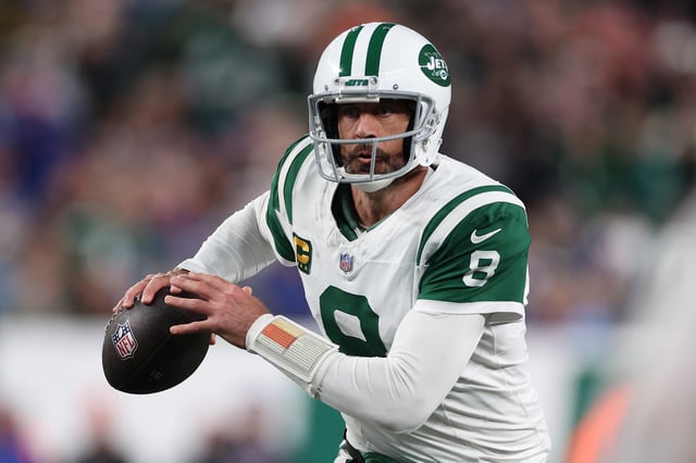 Aaron Rodgers #8 of the New York Jets looks during the first quarter against the Buffalo Bills at MetLife Stadium on October 14, 2024 in East Rutherford, New Jersey.