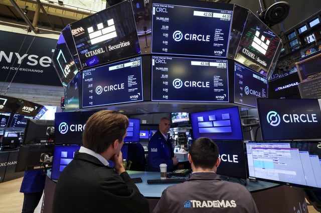 Traders work on the floor at the New York Stock Exchange (NYSE), on the day of Circle Internet Group's IPO, in New York City, U.S., June 5, 2025.  REUTERS/Brendan McDermid