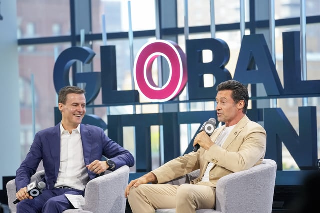 FILE - Actor and Global Citizen Ambassador Hugh Jackman, right, is joined by Global Citizen CEO and Co-Founder Hugh Evans as he addresses attendees of the Global Citizen Now conference, May 2, 2024, in New York. (AP Photo/Mary Altaffer, file)