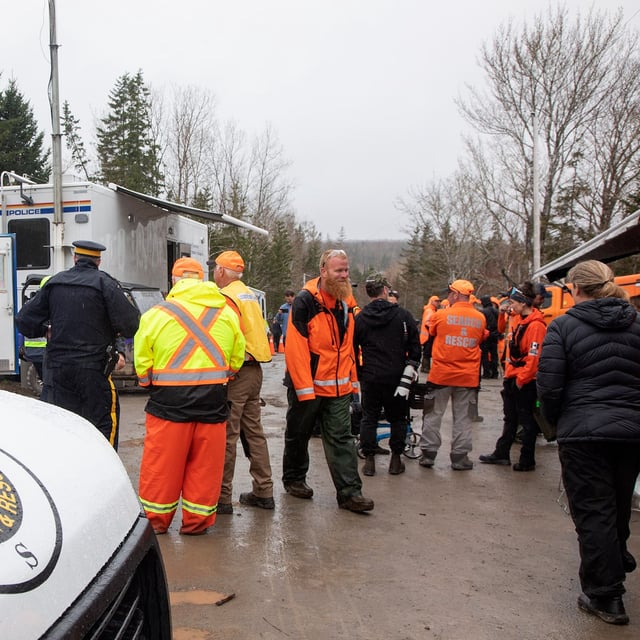 Searchers return to the base camp after looking for six year old Lilly Sullivan and four year old Jack Sullivan, two children missing since May 2, in Lansdowne Station, N.S., Wednesday, May 7, 2025. THE CANADIAN PRESS/Ron Ward