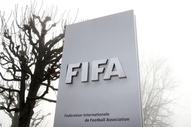 FIFA's logo is seen in front of its headquarters during a foggy autumn day in Zurich, Switzerland November 18, 2020. REUTERS/Arnd Wiegmann/File Photo