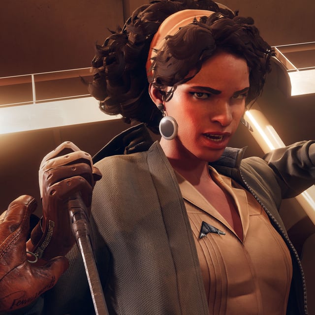 Antagonist Julianna winds a punch while staring angrily