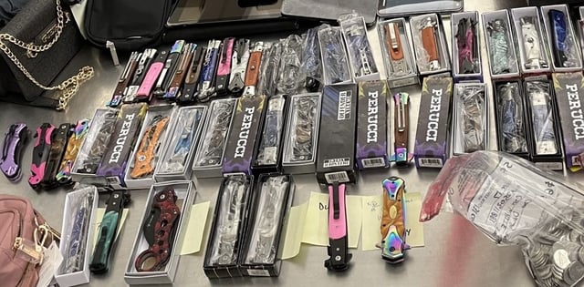 The Edmonton Police Service has charged two men for harbouring illegal and stolen goods including knives and tobacco at a central Edmonton convenience store.