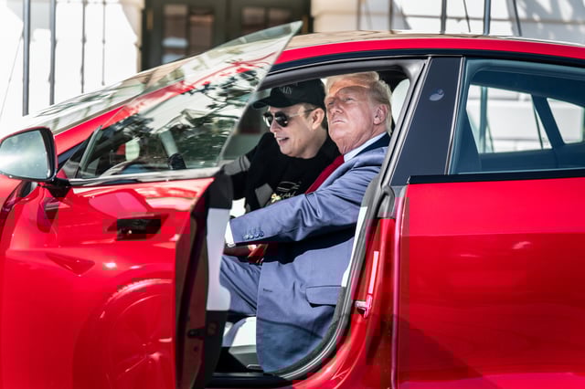 Elon Musk and President Donald Trump inside of a Tesla model S vehicle at the White House on March 11, 2025.