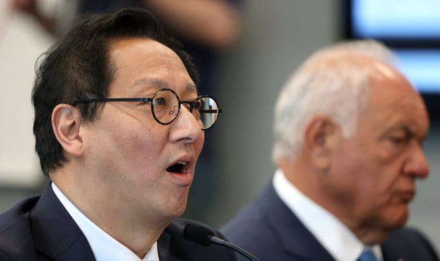 University of Florida president-elect Santa Ono answers a question during a meeting of the Florida Board of Governors in Orlando, Tuesday, June 3, 2025, as Mori Hosseini, right, chairman of the UF Board of Trustees, listens. The governors’ board met at the University of Central Florida’s downtown campus in Orlando to vote on Ono becoming Florida’s 14th president.  (Joe Burbank/Orlando Sentinel)