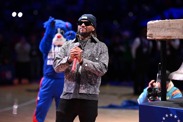 Feb 4, 2025; Philadelphia, Pennsylvania, USA; Former Philadelphia Eagle DeSean Jackson entertains fans before the game between the Philadelphia 76ers and the Dallas Mavericks at Wells Fargo Center. Mandatory Credit: Kyle Ross-Imagn Images